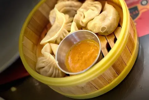 Chicken Momo at Vivaan's Yummies - Steamed Dumplings with Spicy Sauce